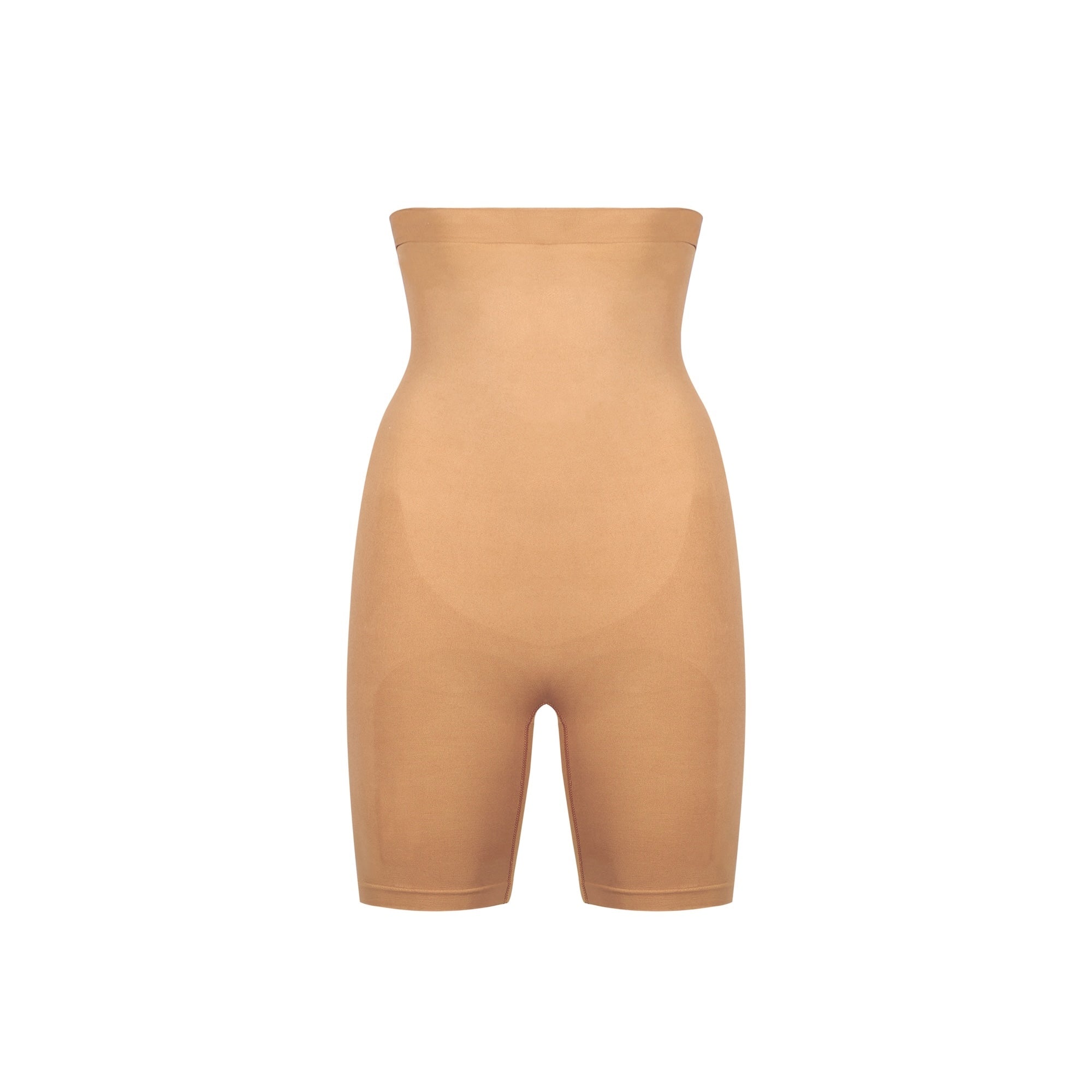 Tan shapewear shorts on a white background