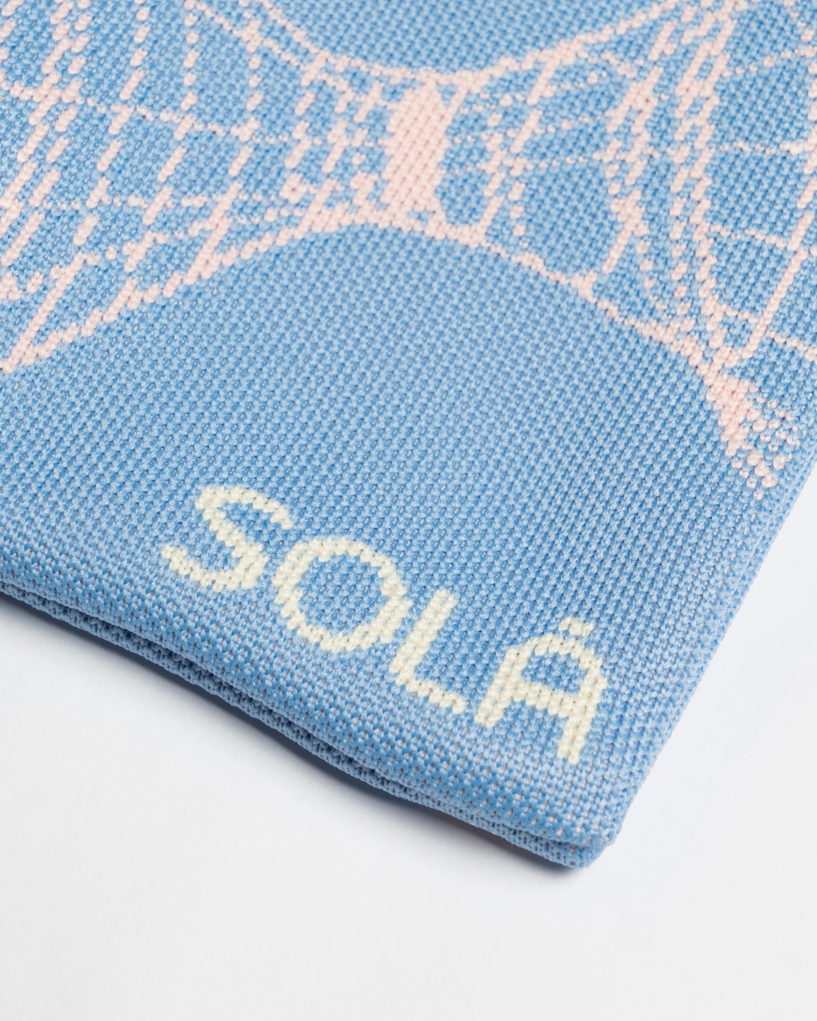 A close up view of Knitted Phone Bag
