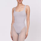 A woman wearing a stone shapewear