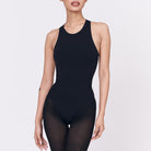 A woman wearing a black shapewear