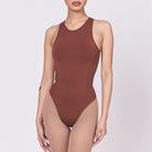 A woman wearing a teddy shapewear