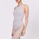 A woman wearing a stone shapewear