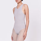 A woman wearing a stone shapewear