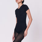 A woman wearing a black shapewear