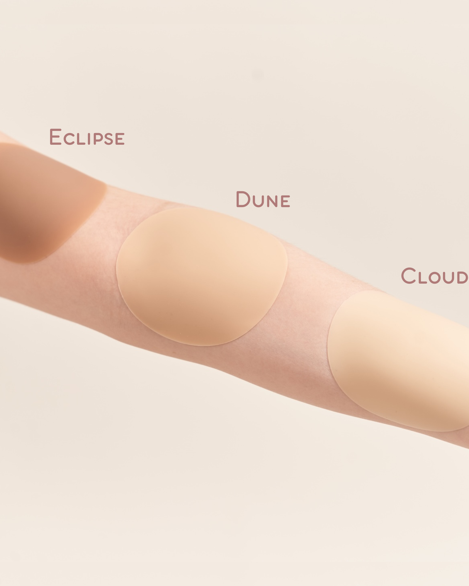 Arm showcasing different shades of nipple cover