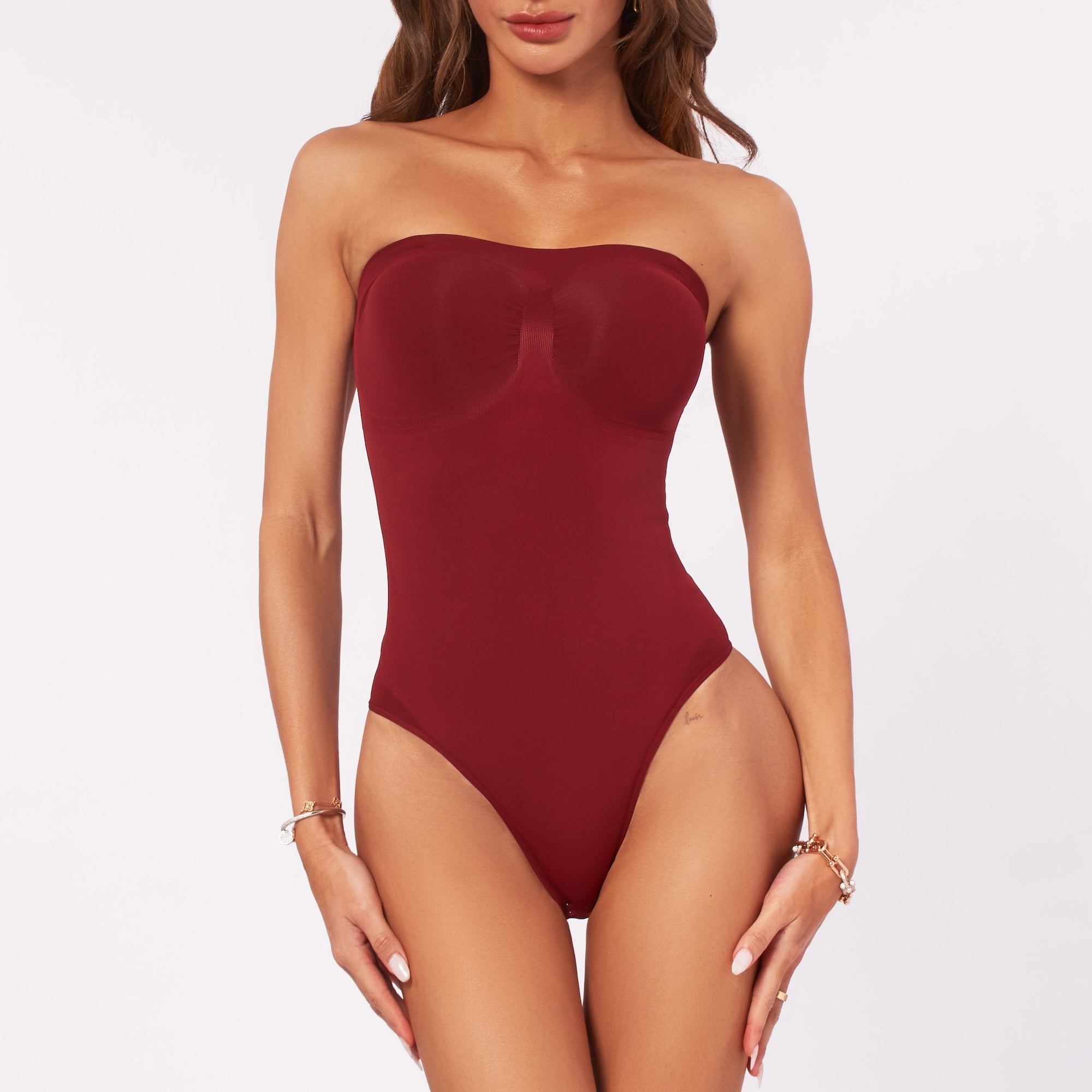 A woman wearing a cherry shapewear