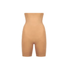 Tan shapewear shorts on a white background