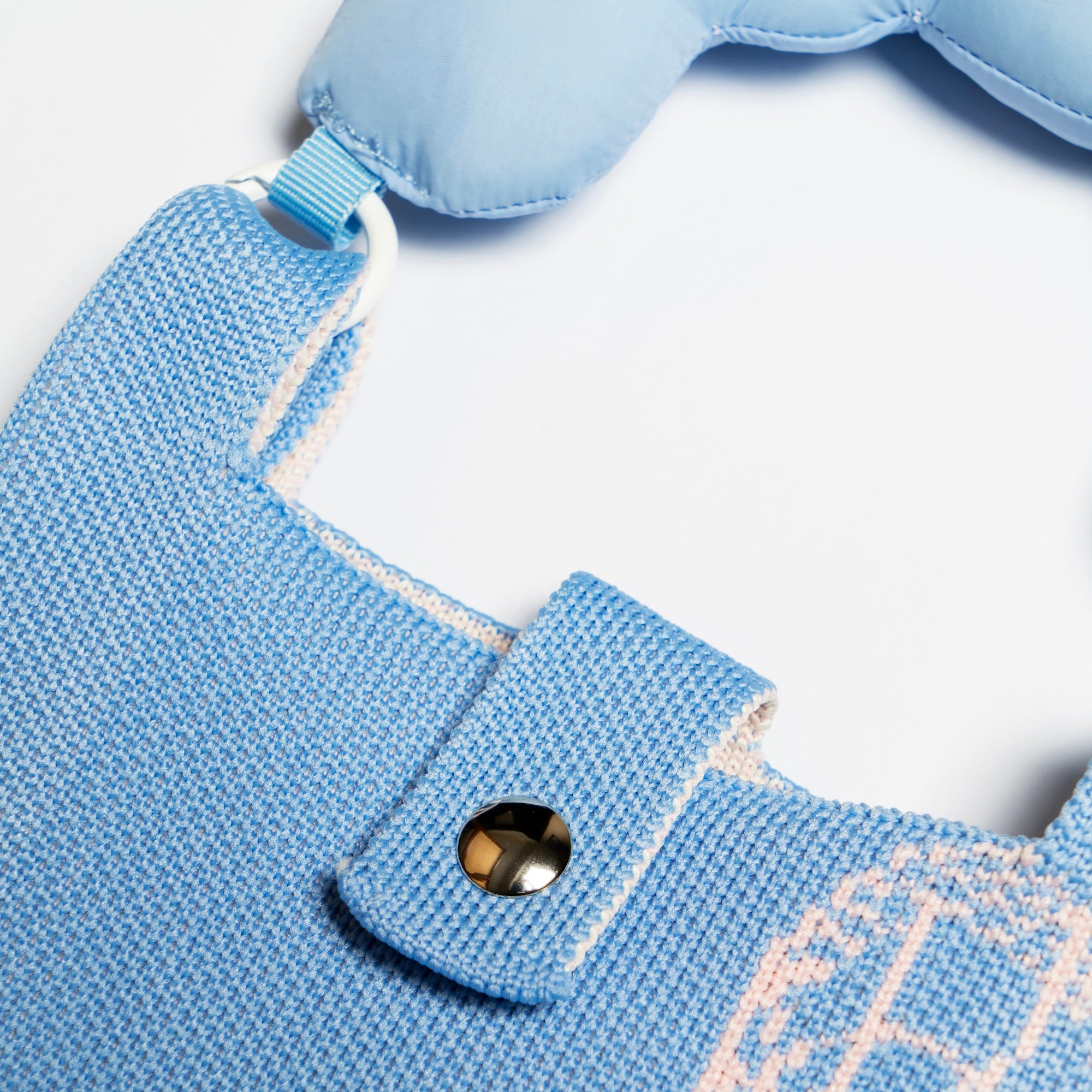 A close up view of Knitted Phone Bag