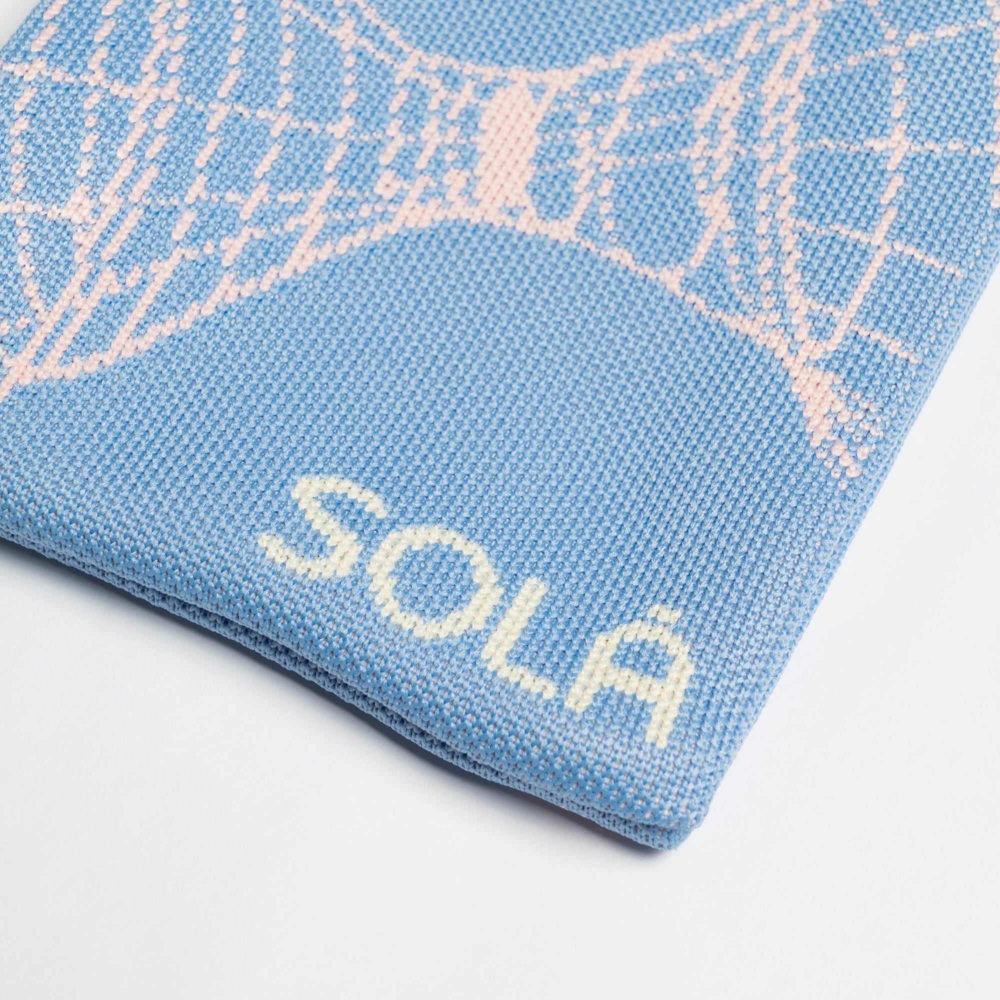 A close up view of Knitted Phone Bag