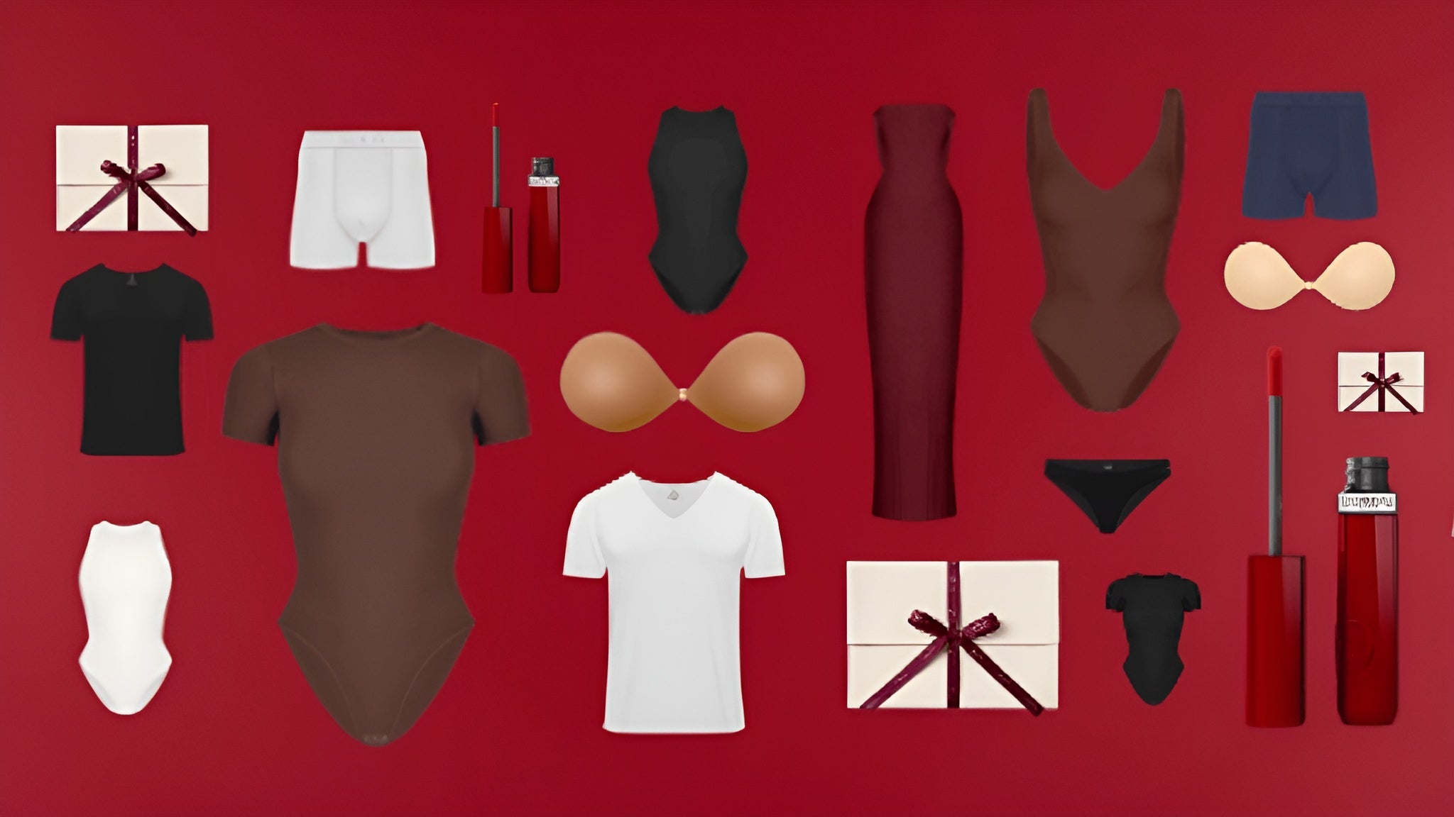 Collection of underwear and related items on a red background